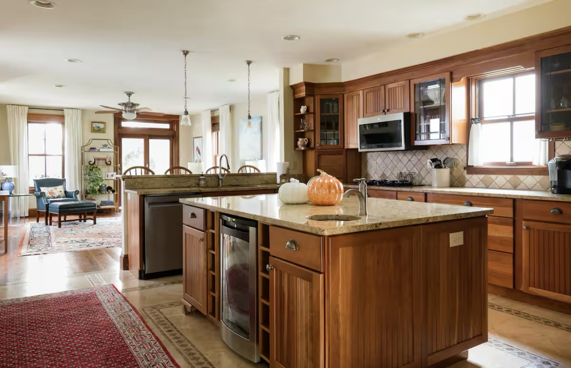 Kitchen — continuity to dining and great room